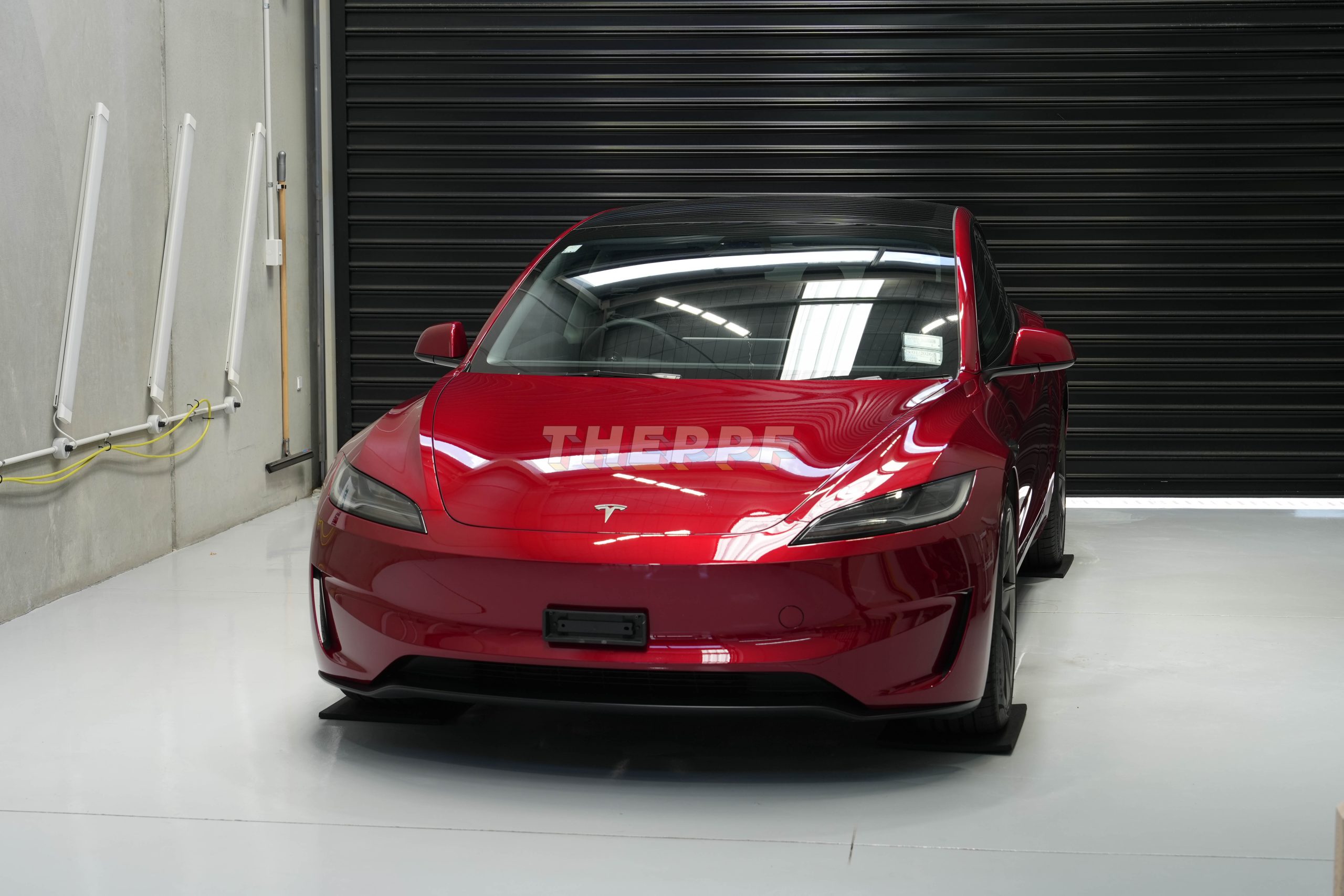 the ppf tesla 3 highland ev car paint protection film wrap auckland