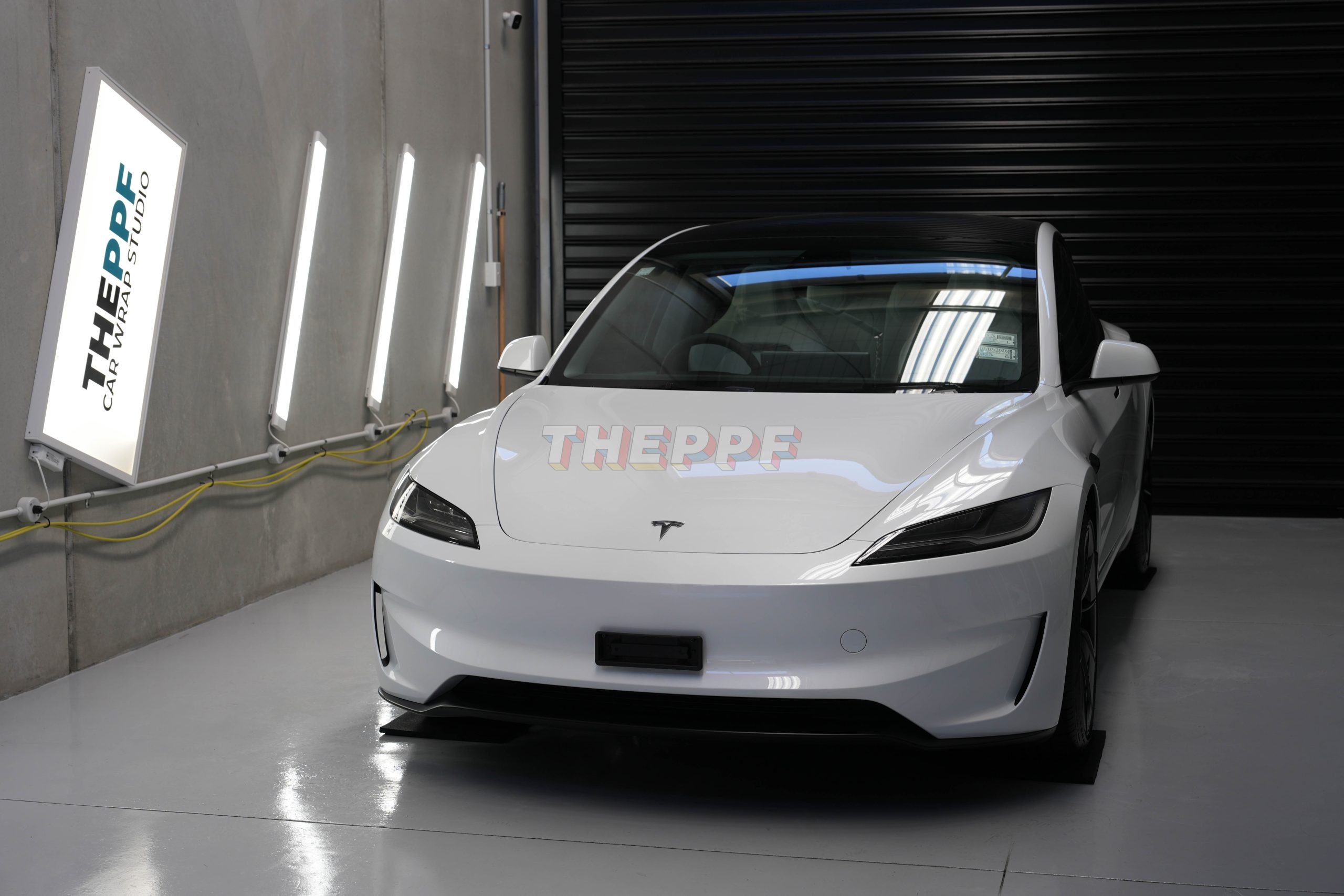 the ppf tesla 3 highland ev car paint protection film wrap auckland