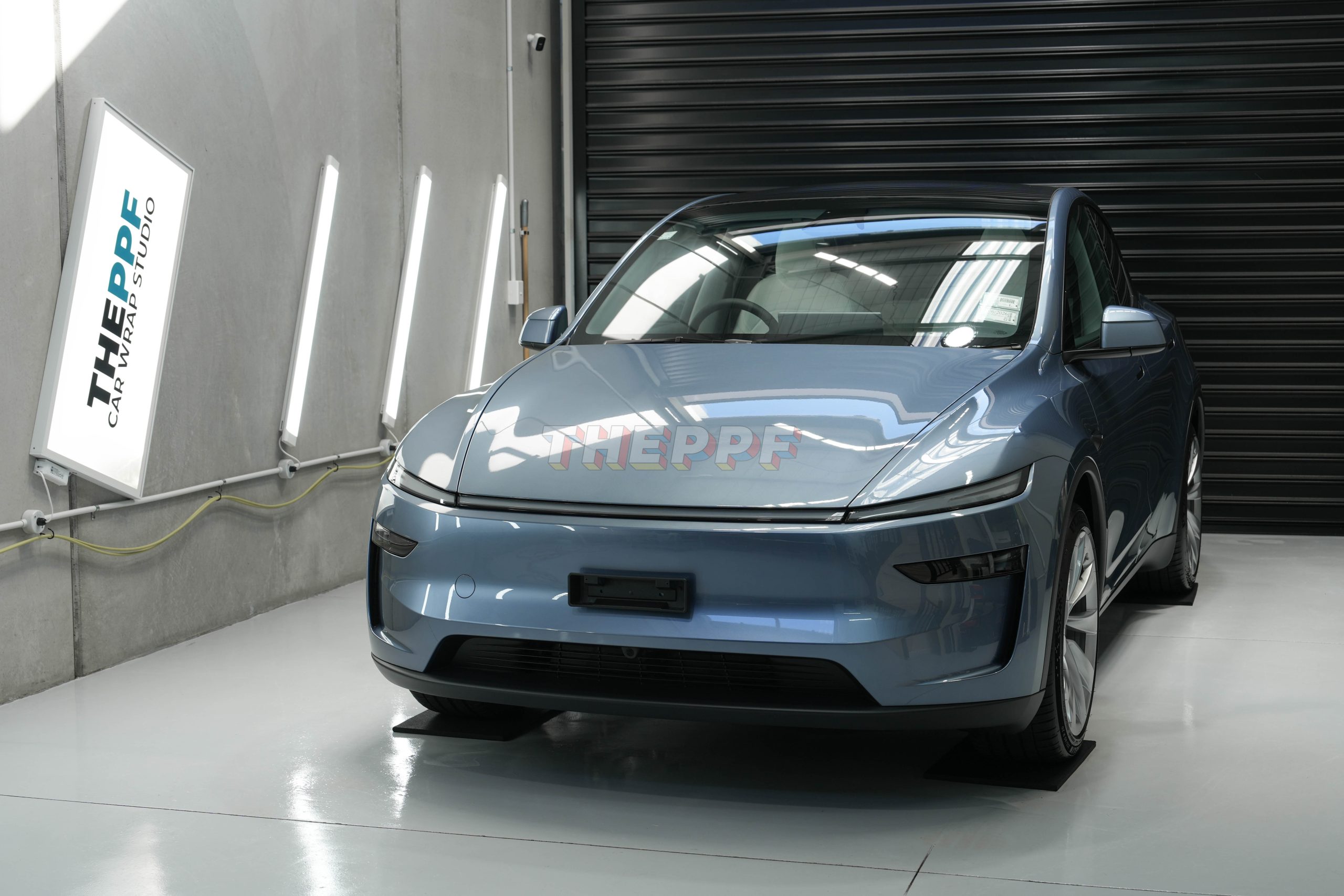 the ppf tesla model y juniper ev car paint protection film wrap auckland
