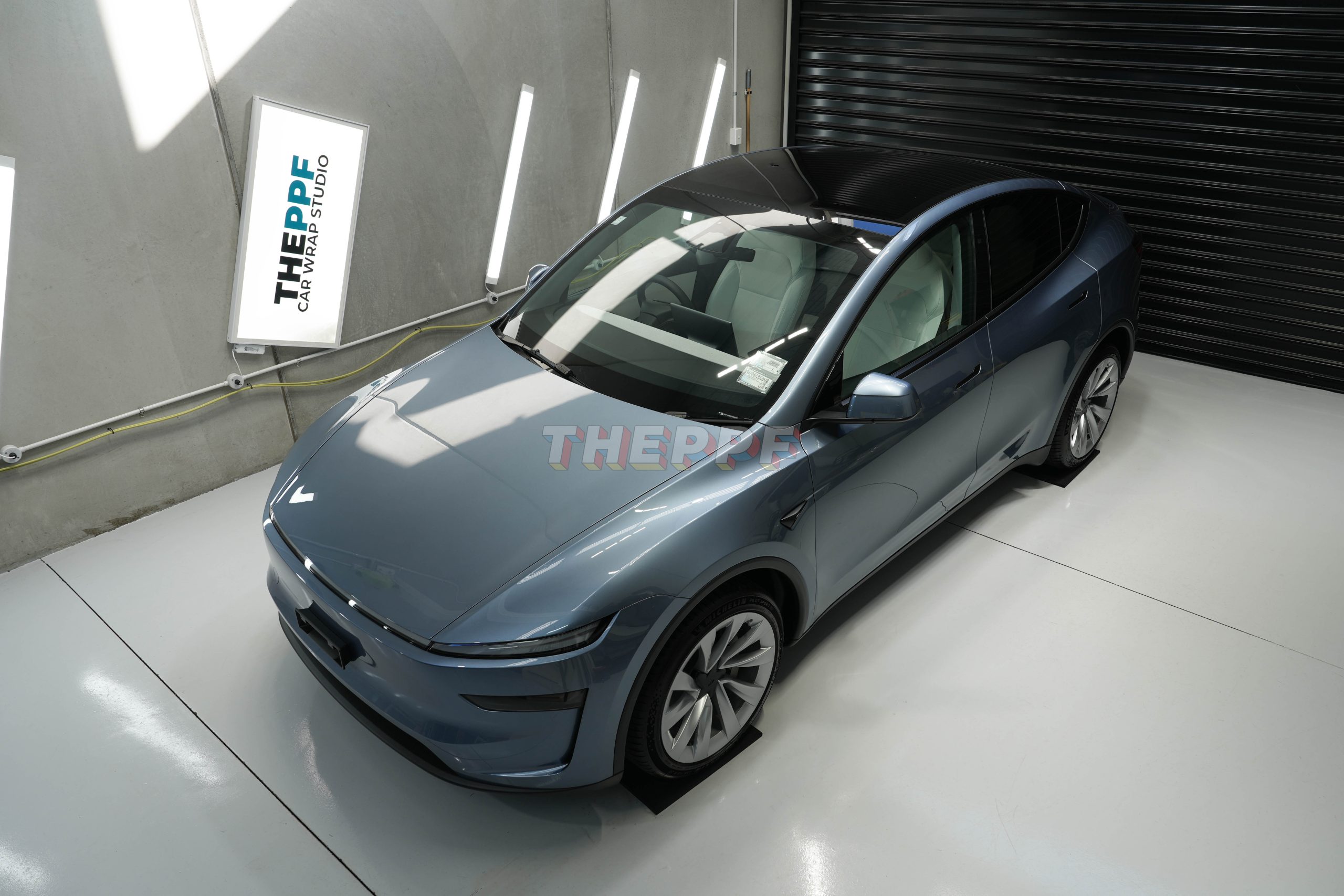 the ppf tesla model y juniper ev car paint protection film wrap auckland